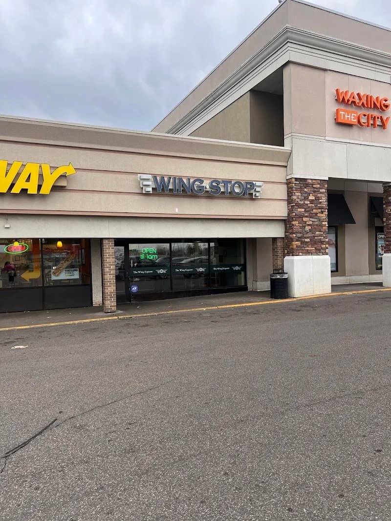 Wingstop storefront outside and inside view at 2100 Snelling Ave #66C in Roseville, Minnesota