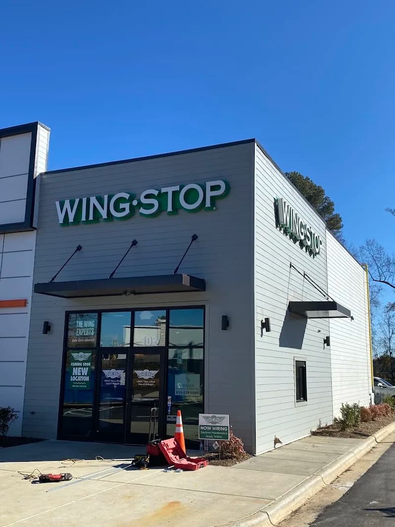 Wingstop storefront outside and inside view at 8215 Fayetteville Road in Raleigh, North Carolina