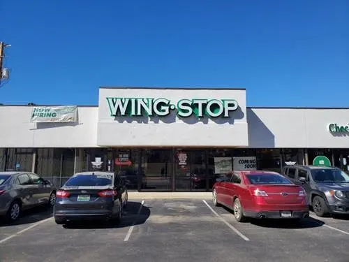 Wingstop storefront outside and inside view at 501 West Town Plaza in Bessemer, Alabama