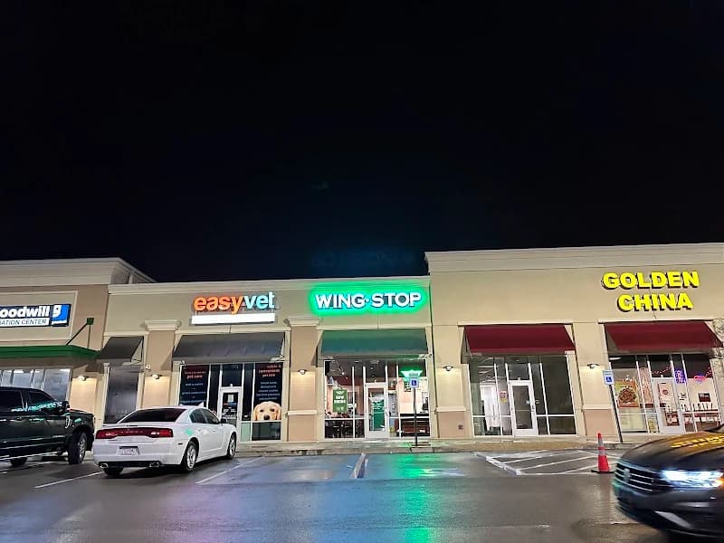 Wingstop storefront outside and inside view at 300 Hughes Rd in Madison, Alabama