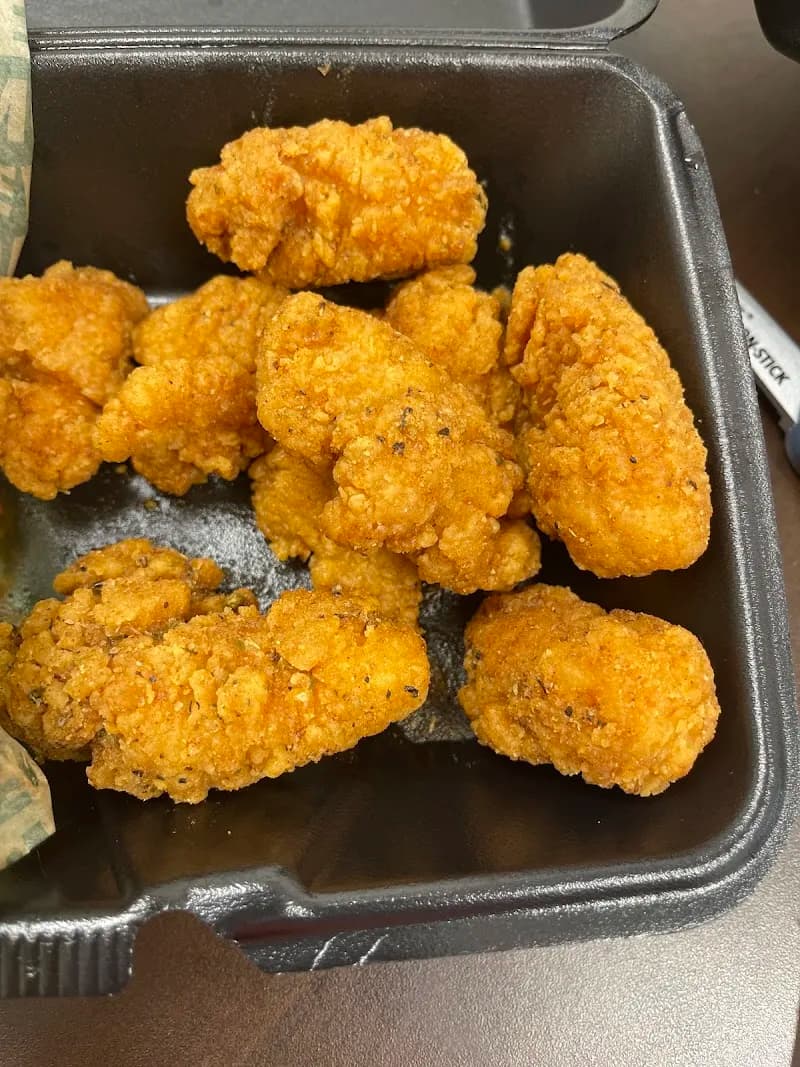 Wingstop storefront outside and inside view at 2017 E 280 Bypass in Phenix City, Alabama