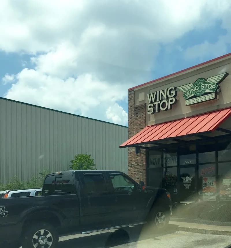 Wingstop storefront outside and inside view at 231 N Walton Blvd in Bentonville, Arkansas