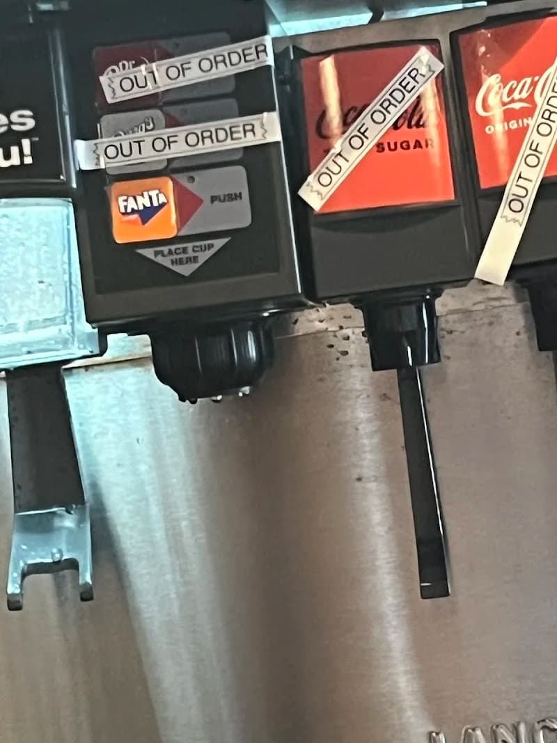 Wingstop storefront outside and inside view at 319 Weir Road in Russellville, Arkansas