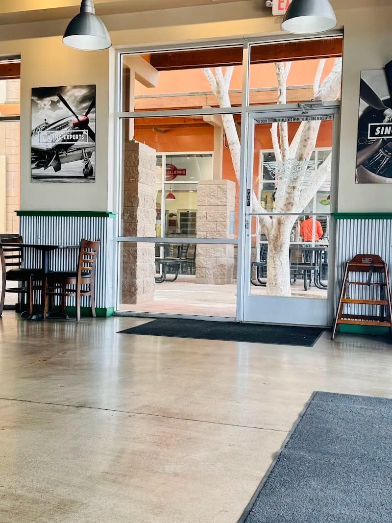 Wingstop storefront outside and inside view at 5838 W Olive Ave in Glendale, Arizona