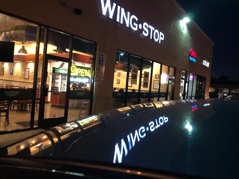 Wingstop storefront outside and inside view at 6702 W Camelback Rd Ste 103 in Glendale, Arizona
