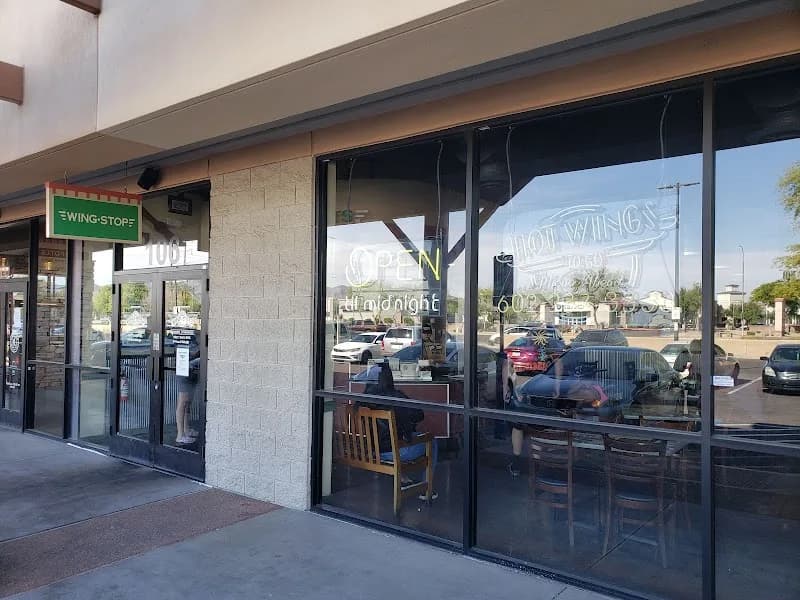 Wingstop storefront outside and inside view at 5130 W Baseline Rd Ste 106 in Laveen, Arizona