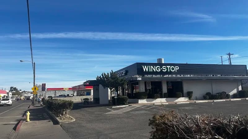 Wingstop storefront outside and inside view at 208 N. Grand Ave in Nogales, Arizona