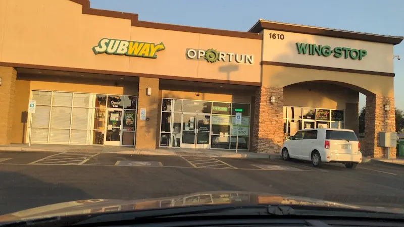 Wingstop storefront outside and inside view at 1610 N 75th Ave in Phoenix, Arizona