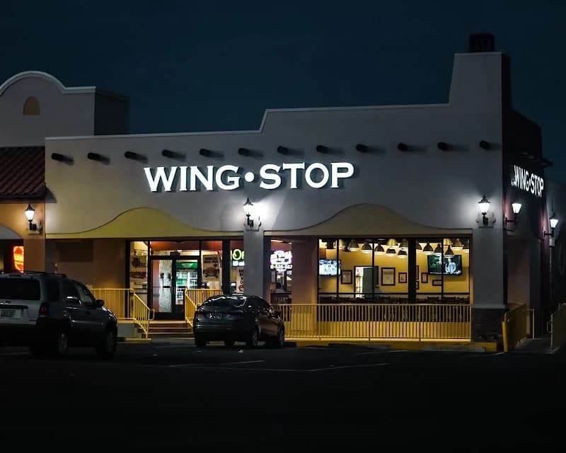 Wingstop storefront outside and inside view at 3155 W Indian School Rd in Phoenix, Arizona
