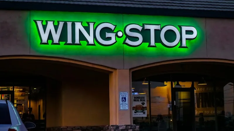 Wingstop storefront outside and inside view at 3202 E. GREENWAY RD in Phoenix, Arizona