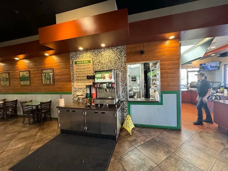 Wingstop storefront outside and inside view at 3031 E Indian School Rd in Phoenix, Arizona