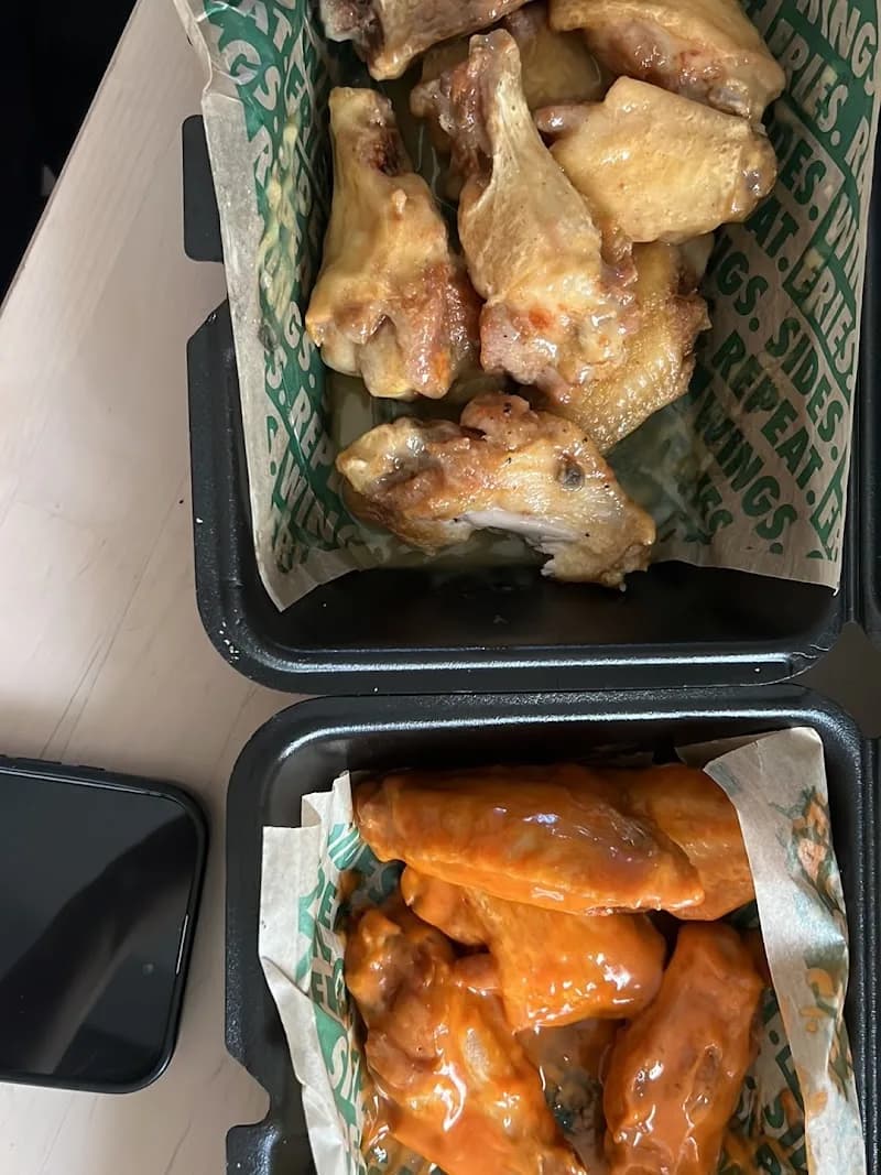 Wingstop storefront outside and inside view at 17865 W Bell Road Suite B-109 in Surprise, Arizona