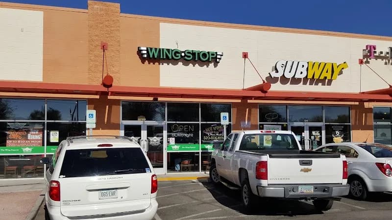 Wingstop storefront outside and inside view at 1710 W Valencia Rd Ste 500 in Tucson, Arizona