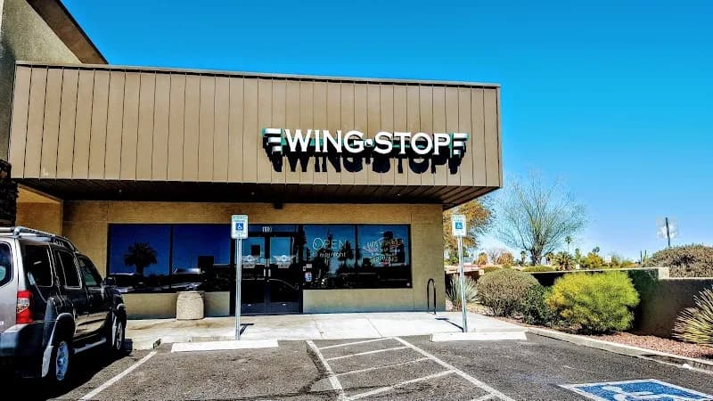 Wingstop storefront outside and inside view at 3662 W Ina Rd Ste 110 in Tucson, Arizona