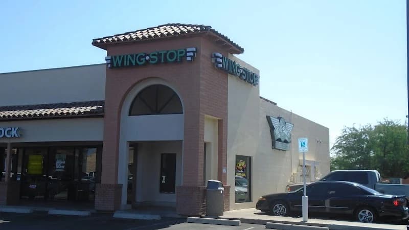 Wingstop storefront outside and inside view at 2106 W Grant Rd in Tucson, Arizona