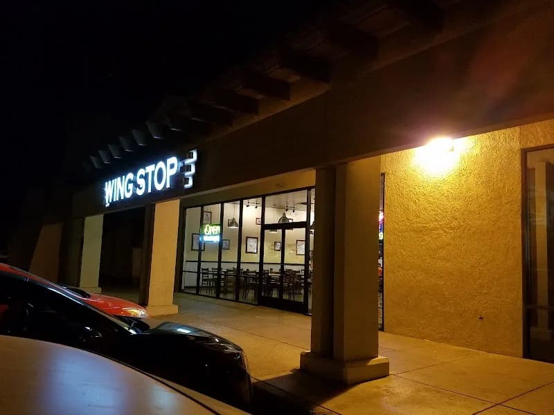 Wingstop storefront outside and inside view at 290 W 32nd St. in Yuma, Arizona
