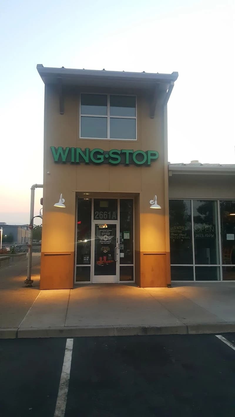 Wingstop storefront outside and inside view at 2661 Blanding Ave Ste A in Alameda, California
