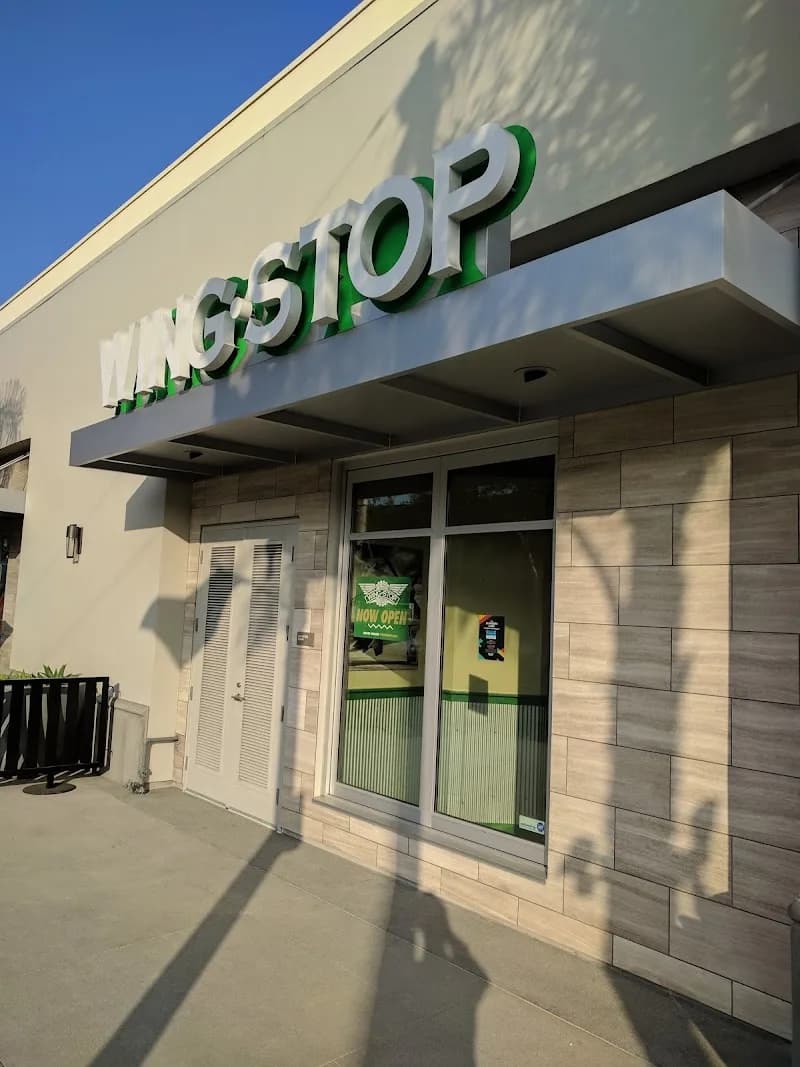 Wingstop storefront outside and inside view at 100 E. Main St. in Alhambra, California