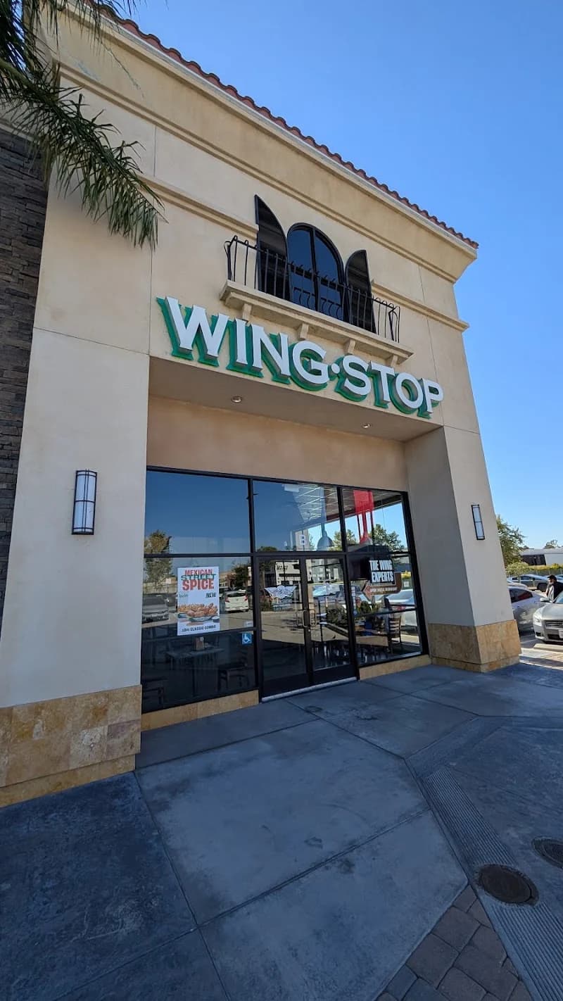 Wingstop storefront outside and inside view at 5631 E La Palma Ave Ste B in Anaheim, California