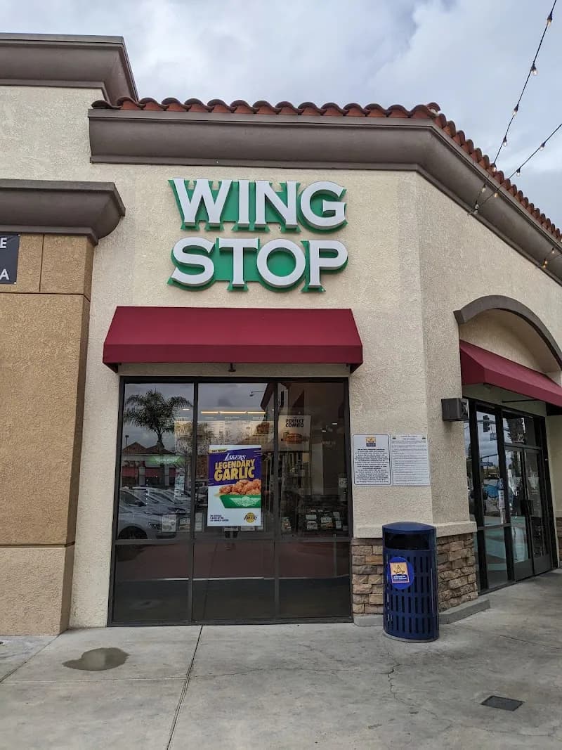Wingstop storefront outside and inside view at 212 S. State College Blvd. in Anaheim, California