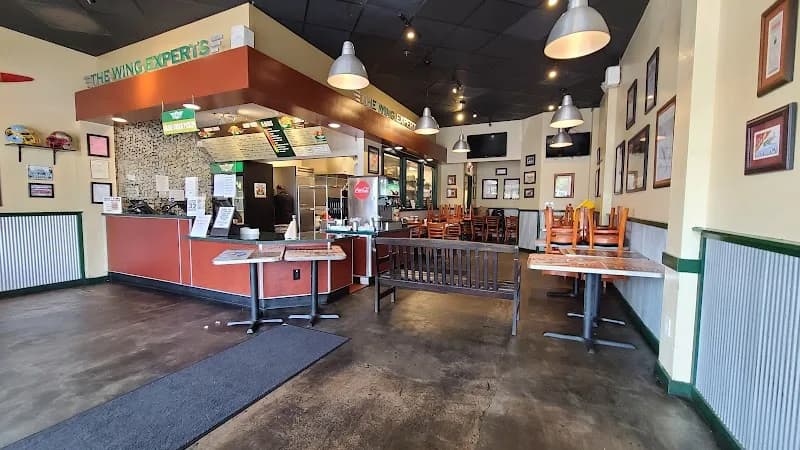 Wingstop storefront outside and inside view at 7909 Walerga Rd in Antelope, California