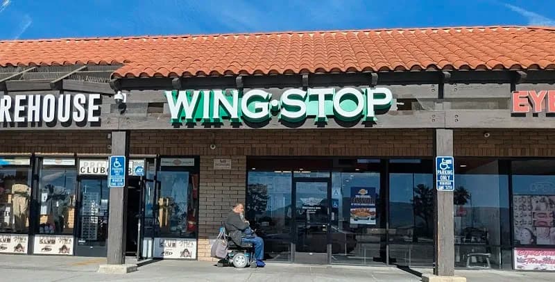 Wingstop storefront outside and inside view at 21620 Bear Valley Rd in Apple Valley, California