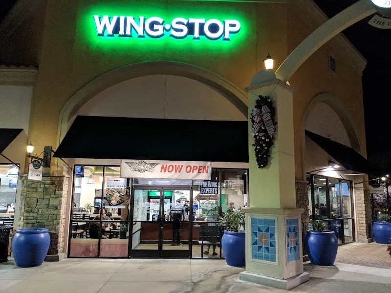 Wingstop storefront outside and inside view at 20434 US Highway 18 Ste 130 in Apple Valley, California