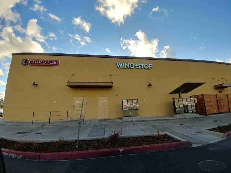 Wingstop storefront outside and inside view at 2845 Bell Rd in Auburn, California
