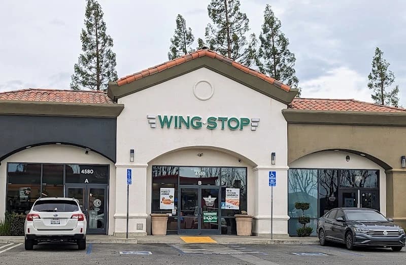 Wingstop storefront outside and inside view at 4580 Coffee Rd in Bakersfield, California