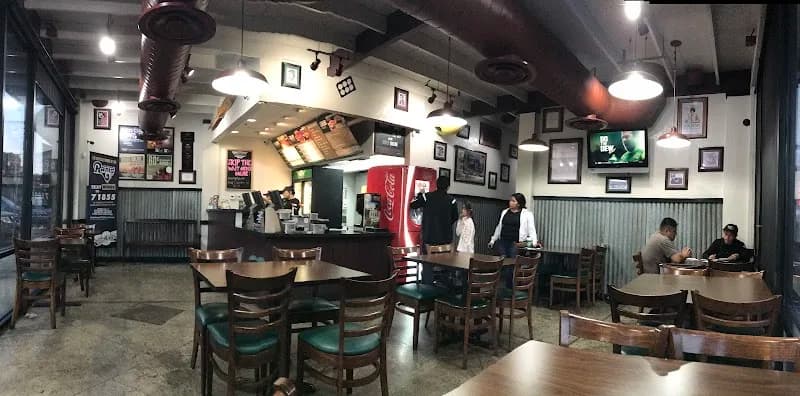 Wingstop storefront outside and inside view at 14307 Bellflower Blvd in Bellflower, California