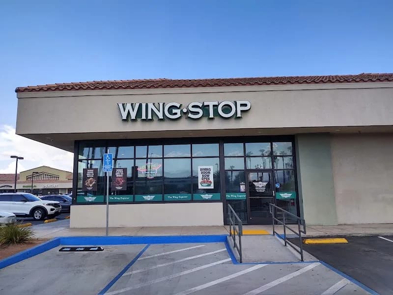 Wingstop storefront outside and inside view at 40100 Washington Street in Bermuda Dunes, California
