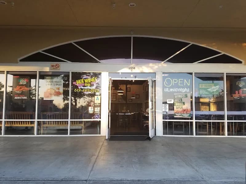 Wingstop storefront outside and inside view at 1550 E H St Ste E in Chula Vista, California