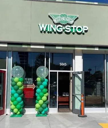 Wingstop storefront outside and inside view at 5045 Juniper Serra Blvd in Colma, California