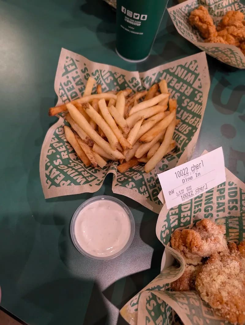 Wingstop storefront outside and inside view at 2791 Green River Rd Ste 101 in Corona, California