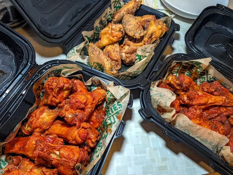 Wingstop storefront outside and inside view at 227 Lake Merced Blvd in Daly City, California