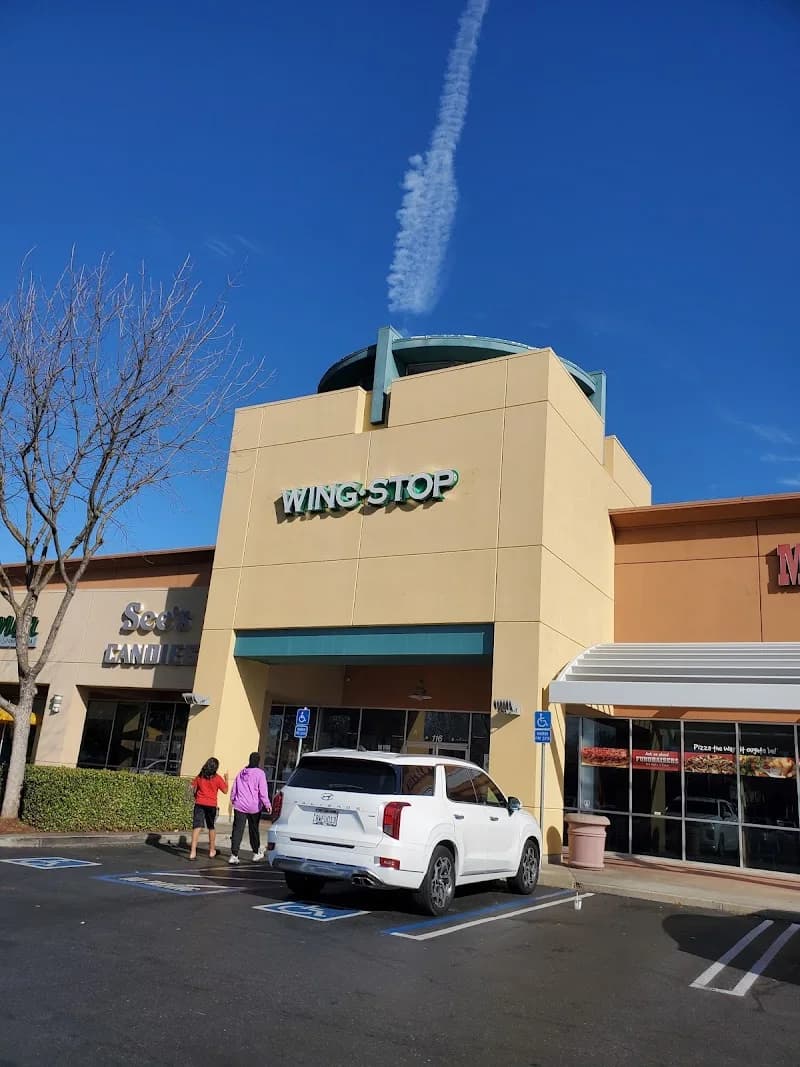 Wingstop storefront outside and inside view at 7440 Laguna Blvd Ste 116 in Elk Grove, California