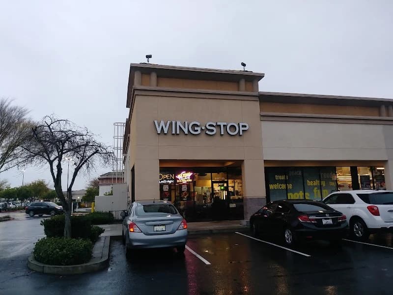 Wingstop storefront outside and inside view at 8447 Elk Grove Florin Rd Ste 50 in Elk Grove, California