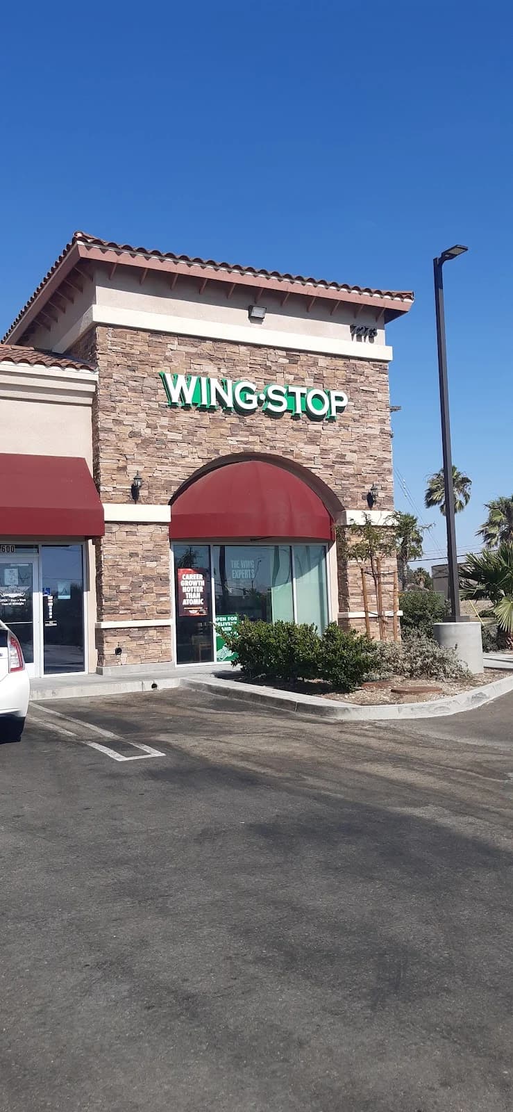 Wingstop storefront outside and inside view at 7273 Citrus Ave. in Fontana, California
