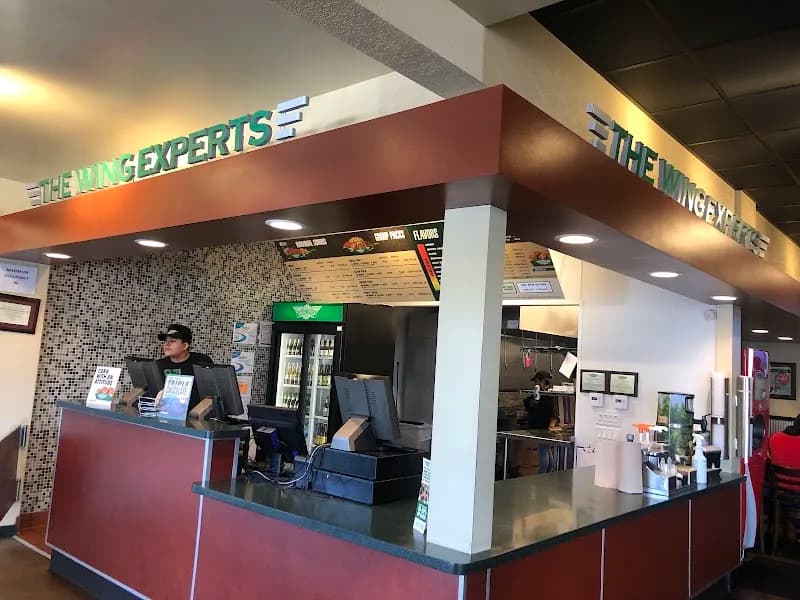 Wingstop storefront outside and inside view at 9737 Chapman Ave in Garden Grove, California