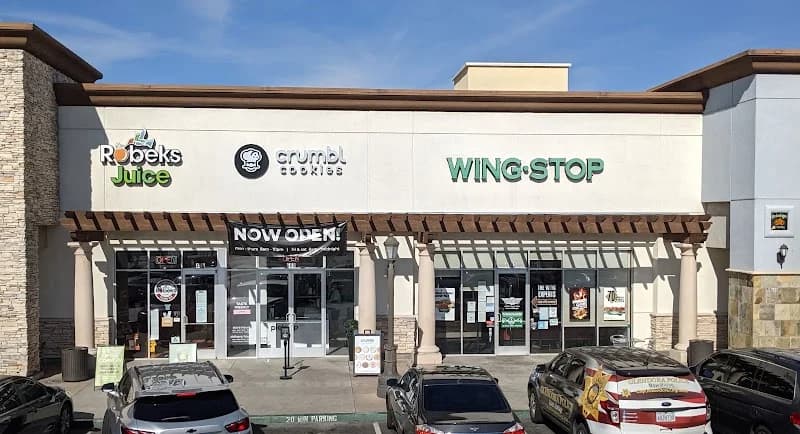 Wingstop storefront outside and inside view at 1365 East Gladstone St Ste 100 in Glendora, California