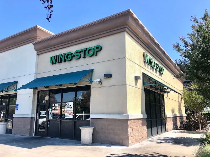 Wingstop storefront outside and inside view at 2490 Whipple Rd in Hayward, California