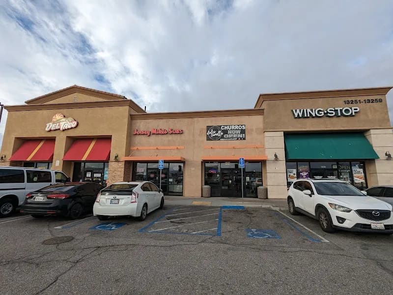 Wingstop storefront outside and inside view at 13259 Main St in Hesperia, California