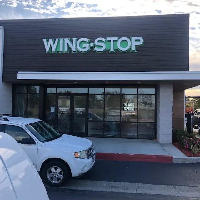 Wingstop storefront outside and inside view at 20100 Magnolia ST in Huntington Beach, California
