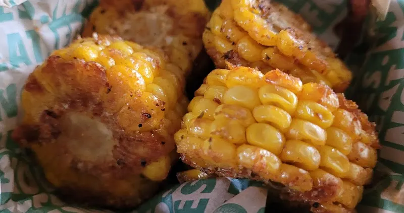 Wingstop storefront outside and inside view at 791 Palm Ave Ste 102 in Imperial Beach, California