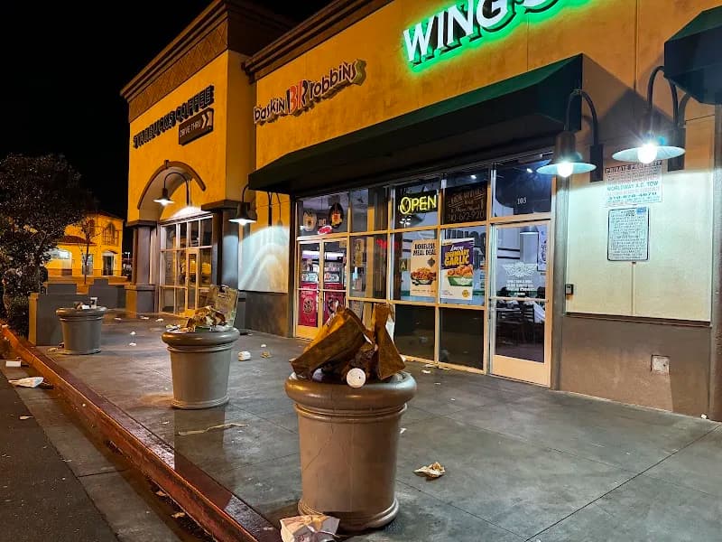 Wingstop storefront outside and inside view at 3551 W Century Blvd Ste 103 in Inglewood, California