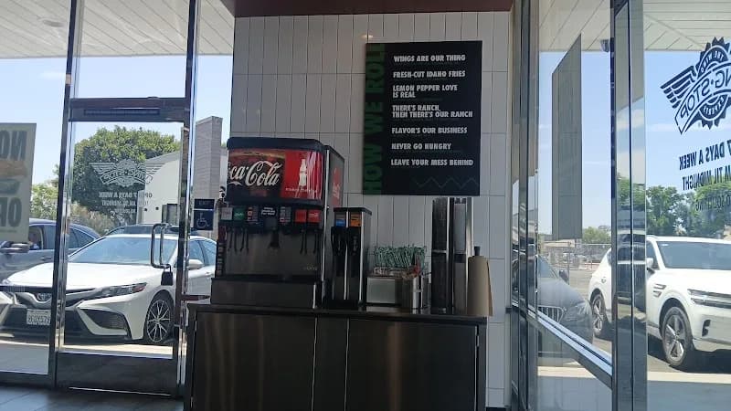Wingstop storefront outside and inside view at 5408 Walnut Ave in Irvine, California