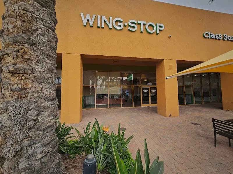 Wingstop storefront outside and inside view at 13250 Jamboree Rd in Irvine, California