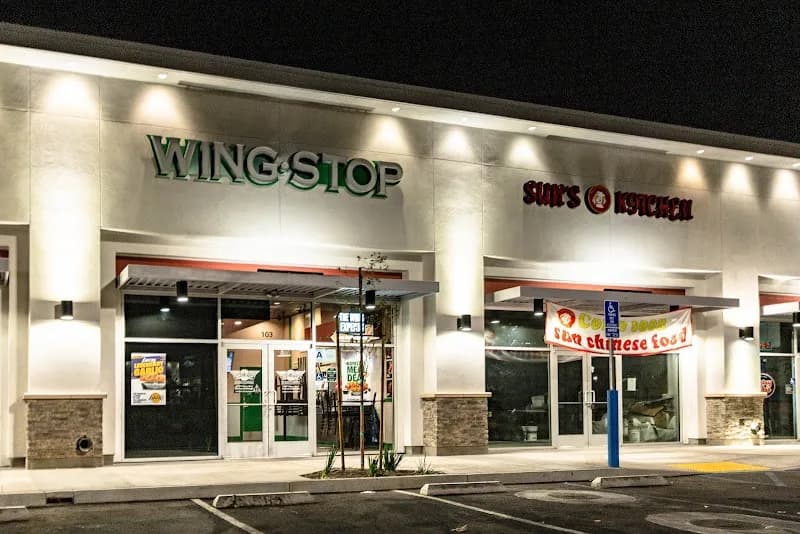 Wingstop storefront outside and inside view at 4190 Pyrite St in Jurupa Valley, California