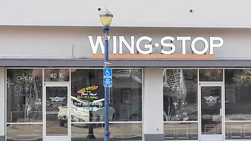 Wingstop storefront outside and inside view at 80 E 4th St Ste E120 in Long Beach, California