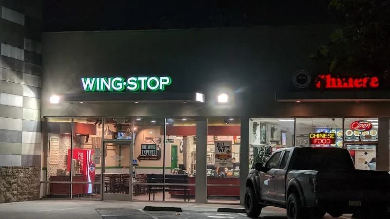 Wingstop storefront outside and inside view at 1504 W Willow St in Long Beach, California